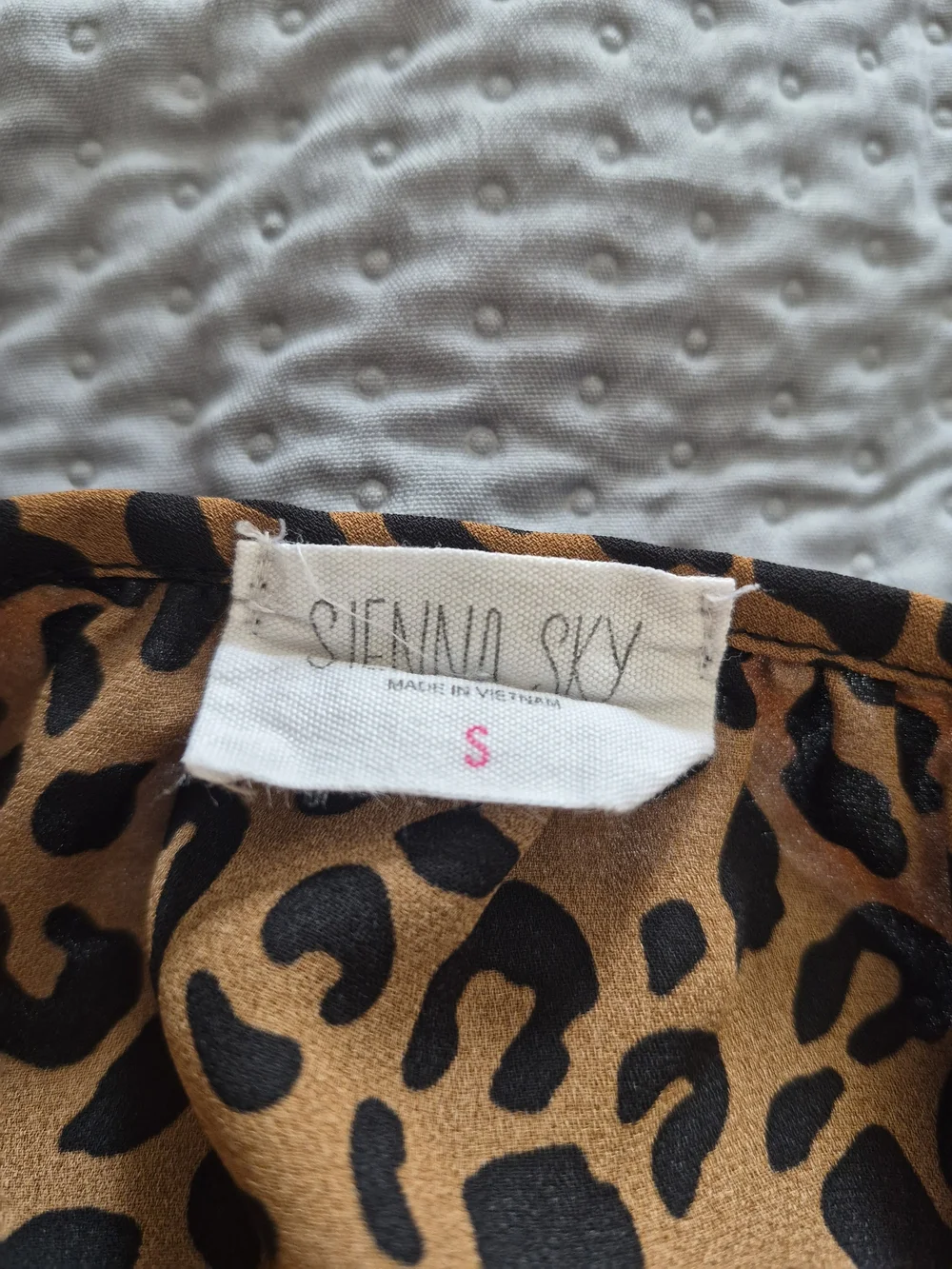Sienna Sky Brown and Black Leopard Ruffle Sleeve Faux Wrap Smocked Hem Top - S